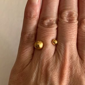 Yellow gold open cuff asymmetrical ball ring